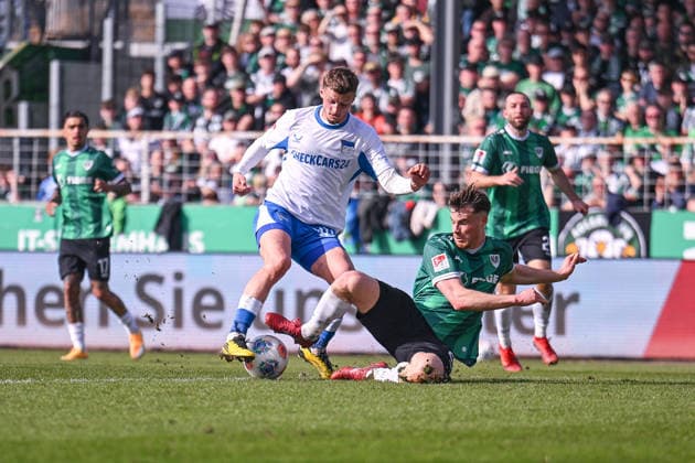 08 03 2026, Football, 2 Bundesliga, 25 Matchday Season 2025 2026, Preußen Münster Hertha BSC, Michaël Cuisance Hertha BSC is fouled by Niko Koulis Preußen Münster Afterwards there is a penalty xRHR PHOTO TKx Copyright: RHR-FOTOx RHR-FOTO TK