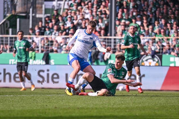 08 03 2026, Football, 2 Bundesliga, 25 Matchday Season 2025 2026, Preußen Münster Hertha BSC, Michaël Cuisance Hertha BSC is fouled by Niko Koulis Preußen Münster Afterwards there is a penalty xRHR PHOTO TKx Copyright: RHR-FOTOx RHR-FOTO TK