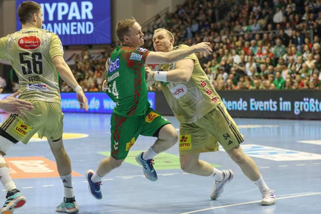 08 03 2026, xgox, Handball Daikin HBL SC Magdeburg TSV Hannover Burgdorf emspor, v l Omar Ingi Magnusson Magdeburg, 14 , Justus Fischer Hannover, 54 duel, duel, fight, tackle Magdeburg
