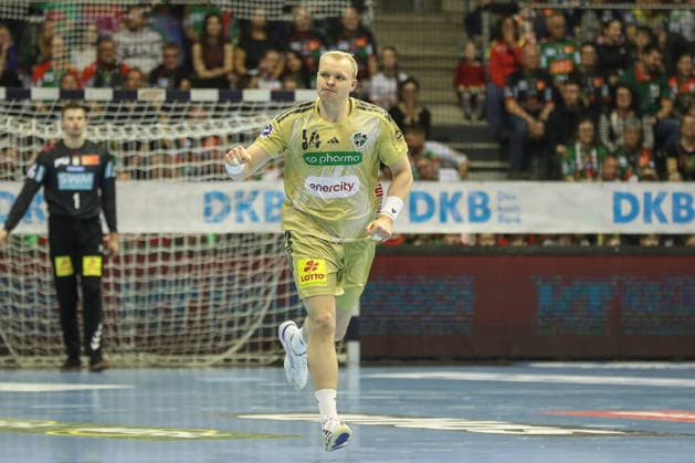 08 03 2026, xgox, Handball Daikin HBL SC Magdeburg TSV Hannover Burgdorf emspor, v l Justus Fischer Hannover, 54 Jubel, Torjubel, jubelt ueber das Tor, celebrate the goal, celebration Magdeburg
