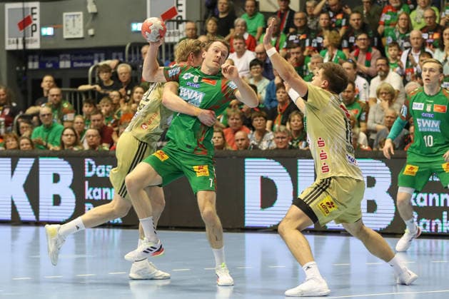 08 03 2026, xgox, Handball Daikin HBL SC Magdeburg TSV Hannover Burgdorf emspor, v l Felix Claar Magdeburg, 7 wirft Tor, Torschuetze, erzielt Tor, Treffer, scores the goal Magdeburg