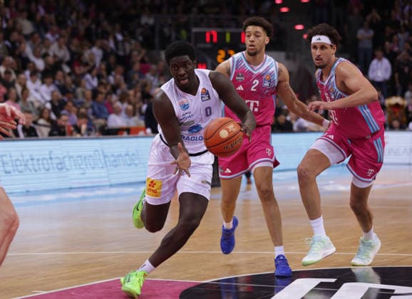 Khyri Thomas MBC on the ball next to Alijah Comithier Bonn and Michael Kessens Bonn , Telekom Baskets Bonn vs Syntainics MBC, easyCredit BBL, Matchday 23, Telekom Dome Bonn, 08 03 2026