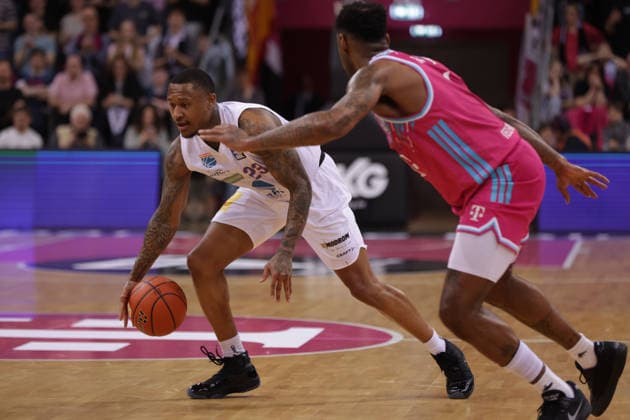 Charles Callison MBC on the ball against Jeff Garrett Bonn , Telekom Baskets Bonn vs Syntainics MBC, easyCredit BBL, Matchday 23, Telekom Dome Bonn, 08 03 2026