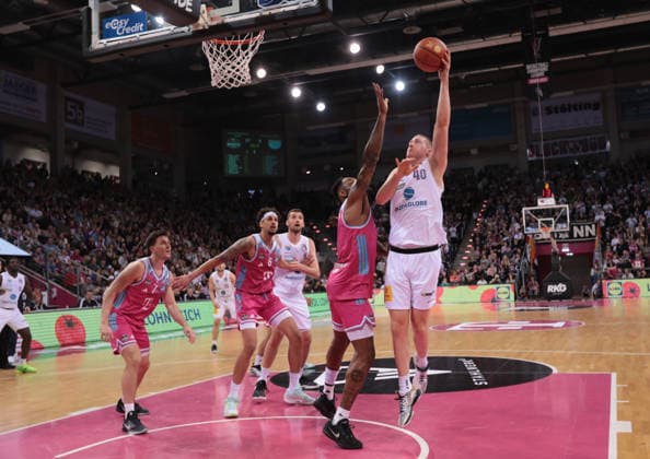 Collin Welp MBC on the ball against Jeff Garrett Bonn , Telekom Baskets Bonn vs Syntainics MBC, easyCredit BBL, Matchday 23, Telekom Dome Bonn, 08 03 2026