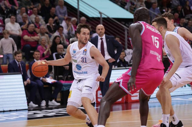 Spencer Reaves MBC on the ball against Kur Jongkuch Bonn , Telekom Baskets Bonn vs Syntainics MBC, easyCredit BBL, Matchday 23, Telekom Dome Bonn, 08 03 2026
