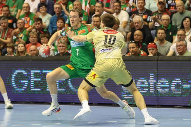 08 03 2026, xgox, Handball Daikin HBL SC Magdeburg TSV Hannover Burgdorf emspor, v l Felix Claar Magdeburg, 7 , Renars Uscins Hannover, 10 duel, duel, fight, tackle Magdeburg