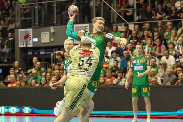 08 03 2026, xgox, Handball Daikin HBL SC Magdeburg TSV Hannover Burgdorf emspor, v l Justus Fischer Hannover, 54 , Gisli Thorgeir Kristjansson Magdeburg, 10 duel, duel, fight, tackle Magdeburg