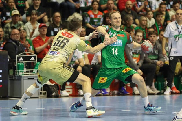 08 03 2026, xgox, Handball Daikin HBL SC Magdeburg TSV Hannover Burgdorf emspor, v l Hannes Feise Hannover, 56 , Omar Ingi Magnusson Magdeburg, 14 duel, duel, fight, tackle Magdeburg