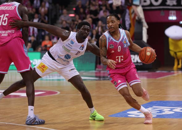 Jalen Finch Bonn on the ball against Khyri Thomas MBC , Telekom Baskets Bonn vs Syntainics MBC, easyCredit BBL, Matchday 23, Telekom Dome Bonn, 08 03 2026