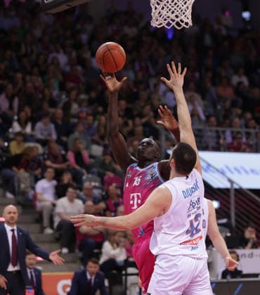 Kur Jongkuch Bonn throws in front of Nemanja Djurisic MBC , Telekom Baskets Bonn vs Syntainics MBC, easyCredit BBL, Matchday 23, Telekom Dome Bonn, 08 03 2026