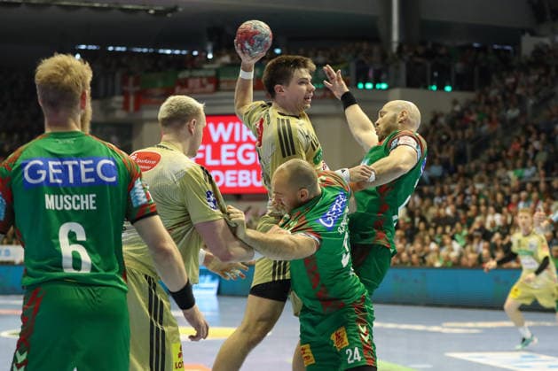 08 03 2026, xgox, Handball Daikin HBL SC Magdeburg TSV Hannover Burgdorf emspor, v l Renars Uscins Hannover, 10 throws goal, Torschuetze, erzielt Tor, Treffer, scores the goal Magdeburg