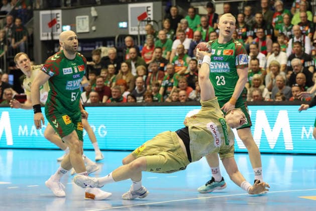 08 03 2026, xgox, Handball Daikin HBL SC Magdeburg TSV Hannover Burgdorf emspor, v l Justus Fischer Hannover, 54 throws goal, Torschuetze, scores goal, Treffer, scores the goal Magdeburg