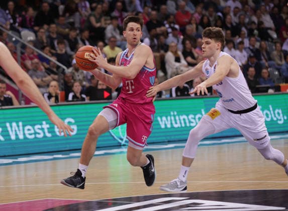 Grayson Murphy Bonn on the ball next to Pertuu Blomgren MBC , Telekom Baskets Bonn vs Syntainics MBC, easyCredit BBL, Matchday 23, Telekom Dome Bonn, 08 03 2026