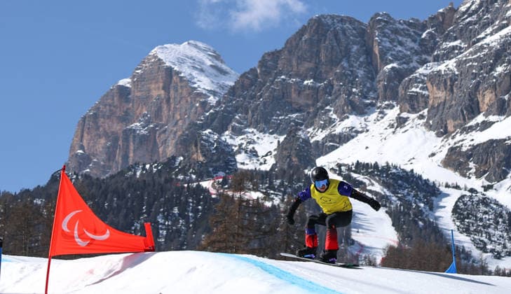(260308) -- CORTINA D AMPEZZO, March 8, 2026 -- Liu Yiyang of China competes during the para snowboard men s cross LL1 event at the Milan-Cortina 2026 Paralympic Winter games, Winterspiele,Spiele, Summer games in Cortina D ampezzo, Italy, March 8, 2026. ) (SP)ITALY-CORTINA D AMPEZZO-PARALYMPIC WINTER GAMES-PARA SNOWBOARD-MEN S CROSS-LL1 WangxKaiyan 