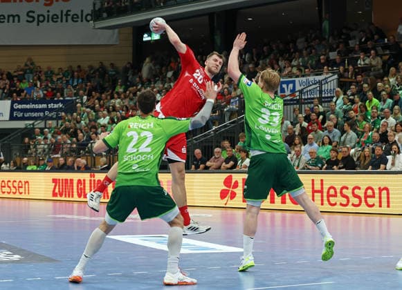 08 03 2026, xovx, Handball Daikin Handball Bundesliga, HSG Wetzlar MT Melsungen v l Jona Schoch HSG Wetzlar , Uladzislau Kulesh MT Melsungen , Georg Löwen HSG Wetzlar Wetzlar Buderus Arena Hessen Germany EN