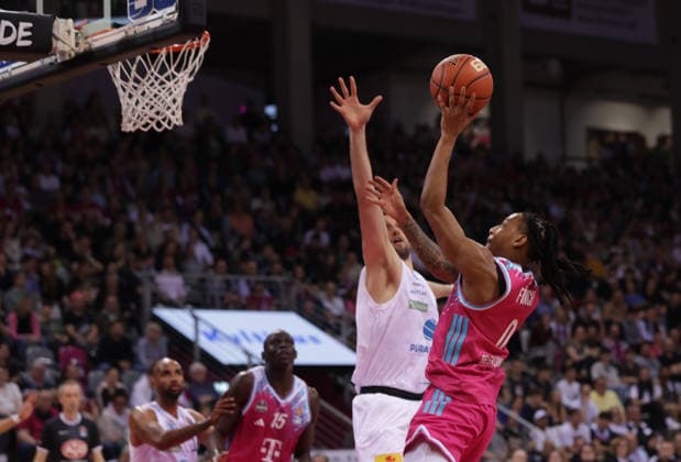 Jalen Finch Bonn throws in front of Kresimir Nikic MBC , Telekom Baskets Bonn vs Syntainics MBC, easyCredit BBL, Matchday 23, Telekom Dome Bonn, 08 03 2026