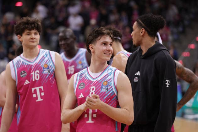 Kenan Reinhart Bonn smiles after the game, on the left is Benjamin Sadikovic Bonn , Telekom Baskets Bonn vs Syntainics MBC, easyCredit BBL, Matchday 23, Telekom Dome Bonn, 08 03 2026