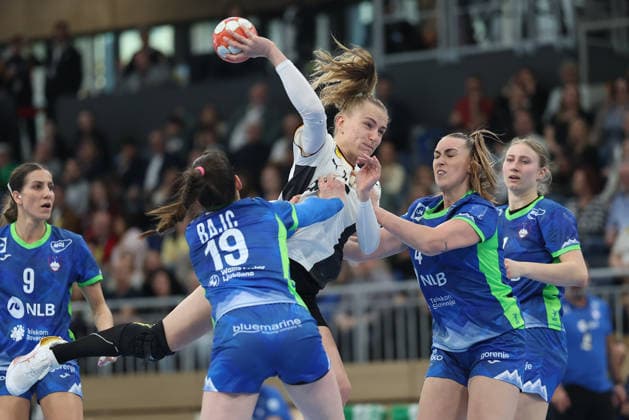Germany Slovenia, European Womens Handball Qualification Annika Lott Germany, 23 comes against Spela Bajc Slovenia, 19 and Erin Novak Slovenia, 4 at the final European Womens Handball Qualification match between Germany and Slovenia on March 8 at SNP dome Heidelberg , Heidelberg Baden Württemberg Germany SNP dome