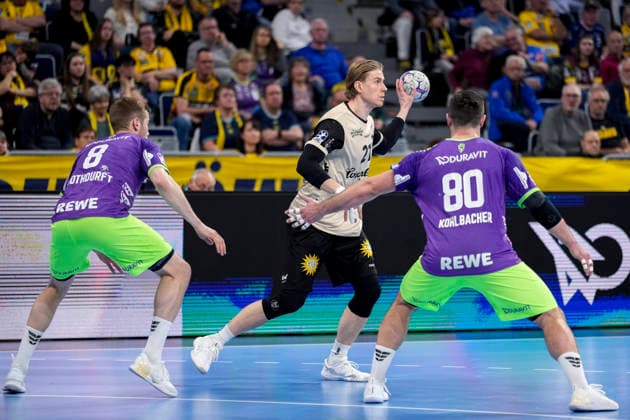 from left Tim Nothdurft RNL, 8 , Kim Voss Fels BHC, 21 , Jannik Kohlbacher RNL, 80 , duel, duel, tackle, tackling, dynamics, action, action, 08 03 2026, Mannheim Germany , Handball, Bundesliga, Rhein Neckar Löwen Bergischer HC xozx