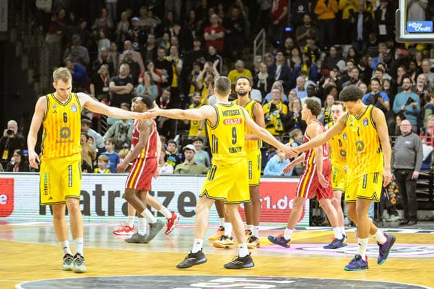 08 03 2026, xlakx, Basketball easyCredit BBL Bundesliga, Alba Berlin Fitness First Würzburg Baskets f l Malte Delow Alba Berlin , Jonas Mattisseck Alba Berlin , Jack Kayil Alba Berlin Cheering about the victory Berlin Daniel Lakomski
