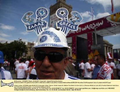 Football, EURO 2012, Greek fans partly fraternise with Polish fans shortly before the opening match