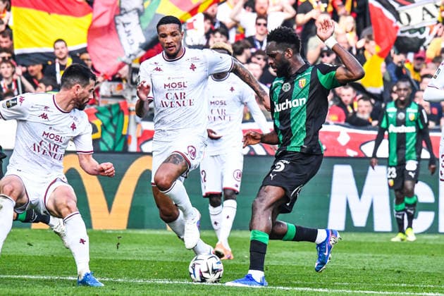 FOOTBALL : RC Lens vs FC Metz - Ligue 1 - JournÃ e 25 - 08 03 2026 Odsonne Edouard (RC Lens) Jean-Philippe Gbamin (FC Metz) LensFrance  Copyright: xBaptistexAutissierx