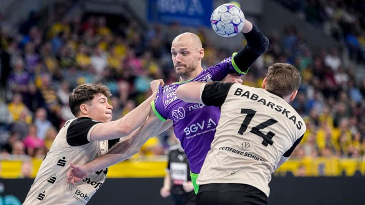 from left Sören Steinhaus BHC, 53 , Lukas Sandell RNL, 11 , Gerdas Babarskas BHC, 14 , duel, duel, tackle, tackling, dynamics, action, action, in purple special jersey for International Womens Day 2026, 08 03 2026, Mannheim Germany , Handball, Bundesliga, Rhein Neckar Löwen Bergischer HC xozx