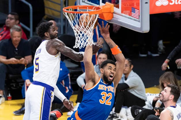 March 8, 2026, Los Angeles, California, USA: New York KnicksÃ¢â‚¬â ¢ Karl-Anthony Towns (32) goes to the basket under pressure from Los Angeles LakersÃ¢â‚¬â ¢ Deandre Ayton (5) during an NBA, Basketball Herren, USA basketball game at Crypto.com Arena on Sunday, March 8, 2026 in Los Angeles. NBA 2026: Knicks Vs Lakers  - ZUMAc68_ 20260308_zaf_c68_015 Copyright: xRingoxChiux