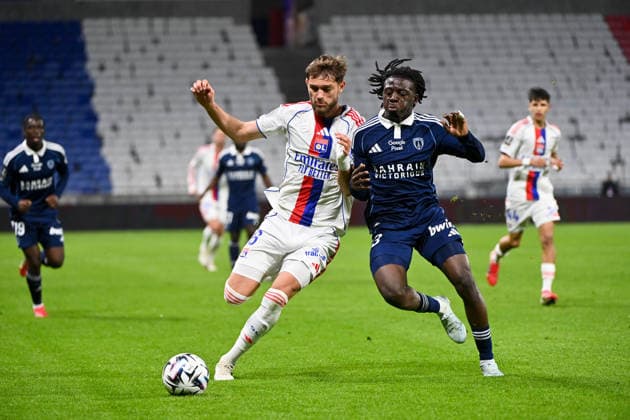 Olympique Lyonnais v Paris FC - Ligue 1 McDonald s 2025 2026 06 Tanner TESSMANN (ol) - 23 Rudy Nzingoula MATONDO (pfc) during the Ligue 1 McDonald s match between Lyon and Paris FC at Groupama Stadium on March 8, 2026 in Lyon, France. Lyon France  Copyright: xFEPx 776348314