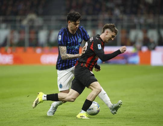 Alexis Saelemaekers of AC Milan and Alessandro Bastoni of FC Inter during the Italian Serie A, season 2025-2026, football match between AC Milan and FC Inter Milano on 08 March 2026 at Giuseppe Meazza Stadium, San Siro, Milan, Italy. Photo, Nderim Kaceli  Copyright: xNderimxKaceli IPAxSportx xipa-agency.netx xx IPA_72588532 IPA_Agency_IPA72588532