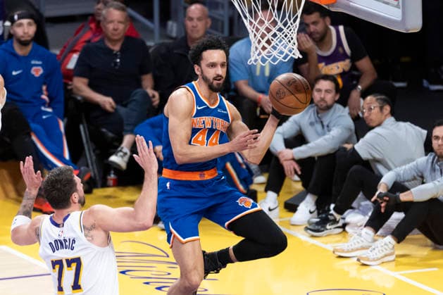 March 8, 2026, Los Angeles, California, USA: New York KnicksÃ¢â‚¬â ¢ Landry Shamet (44) looks to pass while defended by Los Angeles LakersÃ¢â‚¬â ¢ Luka DonÄÂiÄ¡ (77) during an NBA, Basketball Herren, USA basketball game at Crypto.com Arena on Sunday, March 8, 2026 in Los Angeles. NBA 2026: Knicks Vs Lakers  - ZUMAc68_ 20260308_zaf_c68_027 Copyright: xRingoxChiux