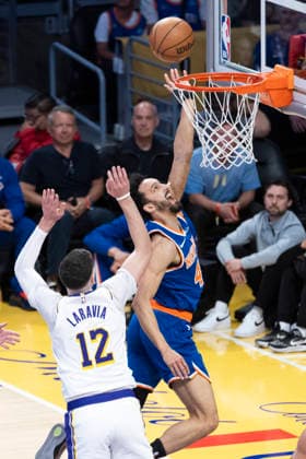 March 8, 2026, Los Angeles, California, USA: New York KnicksÃ¢â‚¬â ¢ Landry Shamet (44) goes past Los Angeles LakersÃ¢â‚¬â ¢ Jake LaRavia (12) to the basket during an NBA, Basketball Herren, USA basketball game at Crypto.com Arena on Sunday, March 8, 2026 in Los Angeles. NBA 2026: Knicks Vs Lakers  - ZUMAc68_ 20260308_zaf_c68_030 Copyright: xRingoxChiux