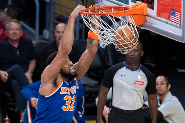 March 8, 2026, Los Angeles, California, USA: New York KnicksÃ¢â‚¬â ¢ Karl-Anthony Towns (32) dunks against the Los Angeles Lakers during an NBA, Basketball Herren, USA basketball game at Crypto.com Arena on Sunday, March 8, 2026 in Los Angeles. NBA 2026: Knicks Vs Lakers  - ZUMAc68_ 20260308_zaf_c68_031 Copyright: xRingoxChiux