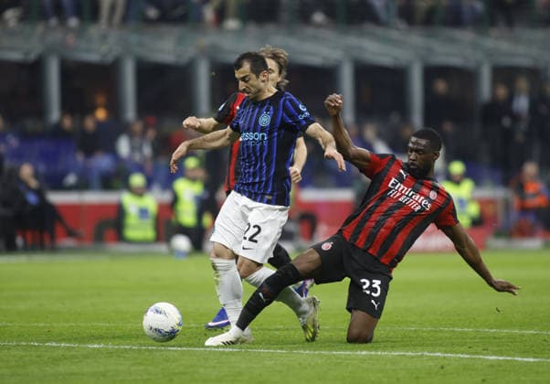 Henrikh Mkhitaryan of FC Inter and Fikayo Tomori of AC Milan fighting for the ball during the Italian Serie A, season 2025-2026, football match between AC Milan and FC Inter Milano on 08 March 2026 at Giuseppe Meazza Stadium, San Siro, Milan, Italy. Photo, Nderim Kaceli  Copyright: xNderimxKaceli IPAxSportx xipa-agency.netx xx IPA_72591036 IPA_Agency_IPA72591036