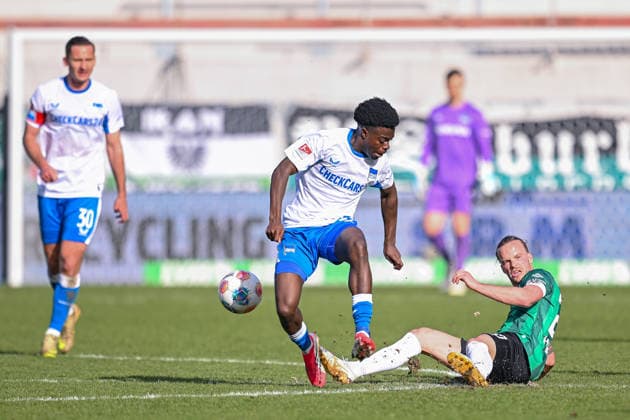 08 03 2026, Soccer, 2 Bundesliga, 25 Matchday Season 2025 2026, Preußen Münster Hertha BSC, Boris Mamuzah Lum Hertha BSC , Jorrit Hendrix Preußen Münster xRHR PHOTO TKx Copyright: RHR-FOTOx RHR-FOTO TK