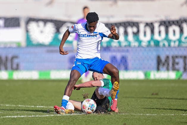 08 03 2026, Soccer, 2 Bundesliga, 25 Matchday Season 2025 2026, Preußen Münster Hertha BSC, Boris Mamuzah Lum Hertha BSC , Jorrit Hendrix Preußen Münster xRHR PHOTO TKx Copyright: RHR-FOTOx RHR-FOTO TK