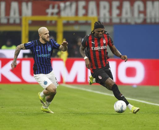 Federico Di Marco of FC Inter and Rafel Leao of AC Milan fighting for the ball during the Italian Serie A, season 2025-2026, football match between AC Milan and FC Inter Milano on 08 March 2026 at Giuseppe Meazza Stadium, San Siro, Milan, Italy. Photo, Nderim Kaceli  Copyright: xNderimxKaceli IPAxSportx xipa-agency.netx xx IPA_72591911 IPA_Agency_IPA72591911