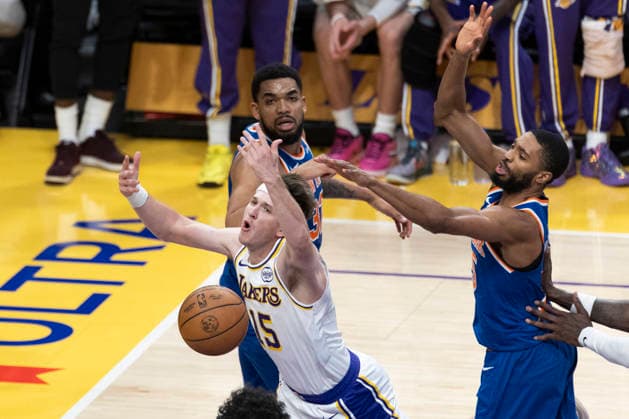 March 8, 2026, Los Angeles, California, USA: Los Angeles LakersÃ¢â‚¬â ¢ Austin Reaves (15) is fouled by New York KnicksÃ¢â‚¬â ¢ Mikal Bridges (25) during an NBA, Basketball Herren, USA basketball game at Crypto.com Arena on Sunday, March 8, 2026 in Los Angeles. NBA 2026: Knicks Vs Lakers  - ZUMAc68_ 20260308_zaf_c68_051 Copyright: xRingoxChiux