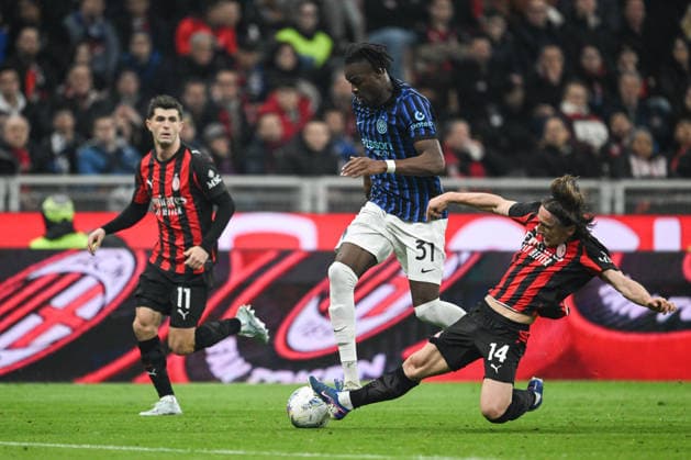 AC Milan v FC Internazionale - Serie A Yann Bisseck of FC Inter and Luka Modric of AC Milan are in action during the Italian Serie A football match between AC Milan and Inter FC Internazionale at Giuseppe Meazza San Siro Stadium in Milan, Italy, on March 8, 2026. Milano Italy  Copyright: xTizianoxBallabiox originalFilename:ballabio-acmilana260308_npU5t.jpg