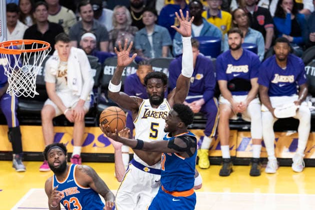 March 8, 2026, Los Angeles, California, USA: New York KnicksÃ¢â‚¬â ¢ Mohamed Diawara (51) goes to the basket against Los Angeles LakersÃ¢â‚¬â ¢ Deandre Ayton (5) during an NBA, Basketball Herren, USA basketball game at Crypto.com Arena on Sunday, March 8, 2026 in Los Angeles. NBA 2026: Knicks Vs Lakers  - ZUMAc68_ 20260308_zaf_c68_060 Copyright: xRingoxChiux