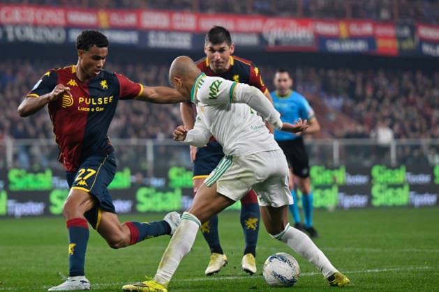 Alessandro Marcandalli (Genoa CFC) - Ruslan Volodymyrovy? Malinovs kyj (Genoa CFC) - Donyell Malen (AS Roma) during Genoa CFC vs AS Roma, Italian soccer Serie A match in Genoa, Italy, March 08 2026  Copyright: xDaniloxVigo IPAxSportx xipa-agency.netx xx IPA_72594520 IPA_Agency_IPA72594520