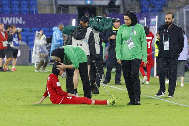 GOLD COAST, AUSTRALIA - MARCH 08 Melika Motevalli (4 IR Iran) looks dejected with Iranian staff member at full time during the Womens Asian Cup match between Islamic Republic of Iran and Philippines at the Gold Coast Stadium on March 08 2026 in Gold Coast, Australia Copyright: xMatthewxStarlingx xSPPx Sportspressphoto_SPR106048