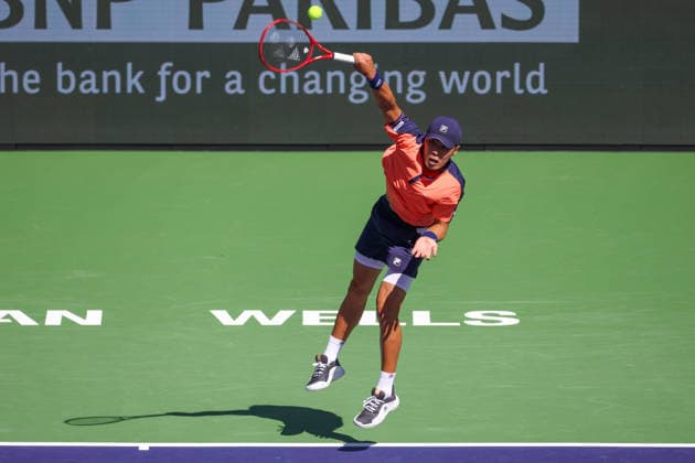INDIAN WELLS, CA - MARCH 08: Brandon Nakashima (USA) serves during the BNP Paribas Open on March 8, 2026 at Indian Wells Tennis Garden in Indian Wells, CA. (Photo by George Walker Icon Sportswire) TENNIS: MAR 08 BNP Paribas Open EDITORIAL USE ONLY Icon260308049
