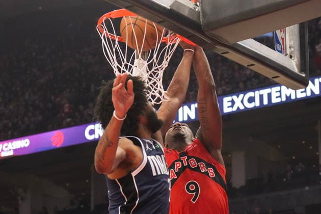 March 8, 2026, Toronto, On, CAN: Toronto Raptors RJ Barrett (9) scores on Dallas Mavericks Marvin Bagley III (35) during first half NBA, Basketball Herren, USA basketball action in Toronto on Sunday, March 8, 2026. RJ Barrett; Marvin Bagley III  - ZUMAc35_ 20260308_zaf_c35_111 Copyright: xChrisxYoungx