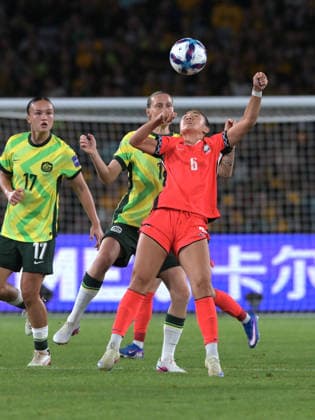 March 8, 2026, Sydney, Australia: Casey Phair (front) of Republic of Korea women football team and Emily Van Egmond (back) of Australia women football team seen in action during the AFC Women s Asian Cup Group A match between Australia and Republic of Korea held at the Stadium Australia. Final score Australia 3:3 Republic of Korea. Australia Vs Republic Of Korea In Sydney - 08 Mar 2026  - ZUMAs197 20260308_aaa_s197_330 Copyright: xLuisxVeniegrax