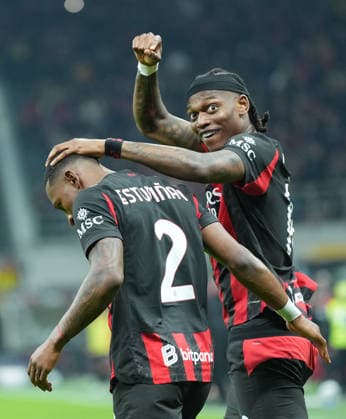 (260309) -- MILAN, March 9, 2026 -- AC Milan s Pervis Estupinan (L) celebrates his goal with his teammate Rafael Leao during an Italian Serie A football match between AC Milan and Inter Milan in Milan, Italy, March 8, 2026. ) (SP)ITALY-MILAN-FOOTBALL-SERIE A-AC MILAN VS INTER MILAN LixJing 