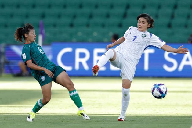 SOCCER ASIAN CUP BANGLADESH UZBEKISTAN, Monika Chakma of Bangladesh and Nilufar Kudratova of Uzbekistan compete for the ball during the AFC Women™s Asian Cup Group B match between Bangladesh and Uzbekistan at HBF Park in Perth, Monday, March 9, 2026.( NO ARCHIVING, EDITORIAL USE ONLY PERTH WESTERN AUSTRALIA AUSTRALIA  Copyright: xRICHARDxWAINWRIGHTx 20260309164413534918