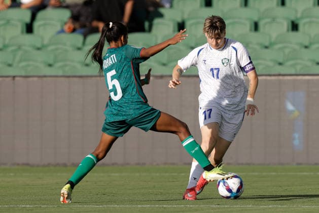 SOCCER ASIAN CUP BANGLADESH UZBEKISTAN, Lyudmila Karachik of Uzbekistan is tackled by Kohati Kisku of Bangladesh during the AFC Women™s Asian Cup Group B match between Bangladesh and Uzbekistan at HBF Park in Perth, Monday, March 9, 2026.( NO ARCHIVING, EDITORIAL USE ONLY PERTH WESTERN AUSTRALIA AUSTRALIA  Copyright: xRICHARDxWAINWRIGHTx 20260309155146180060