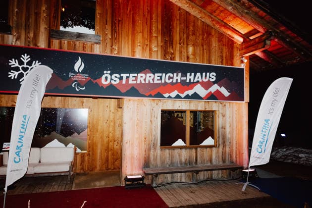 PARALYMPICS - Winter Paralympics Milano Cortina 2026 CORTINA D AMPEZZO,ITALY,09.MAR.26 - PARALYMPICS - Paralympic Winter games, Winterspiele,Spiele, Summer games Milano Cortina 2026, Austria House, Kaernten-Abend. Image shows a feature of the Oesterreich Haus with flags from carinthia.  GEPAxpictures xMatthiasxTrinkl