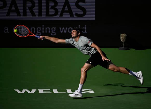 March 09, 2026 Taylor Fritz returns a shot against Alex Michelsen during their third round match at the BNP Paribas Open held at the Indian Wells Tennis Garden in Indian Wells, California. California. Mandatory Photo Credit : CSM Indian Wells United States of America - ZUMAc04_ 20260309_zma_c04_219 Copyright: xCharlesxBausx